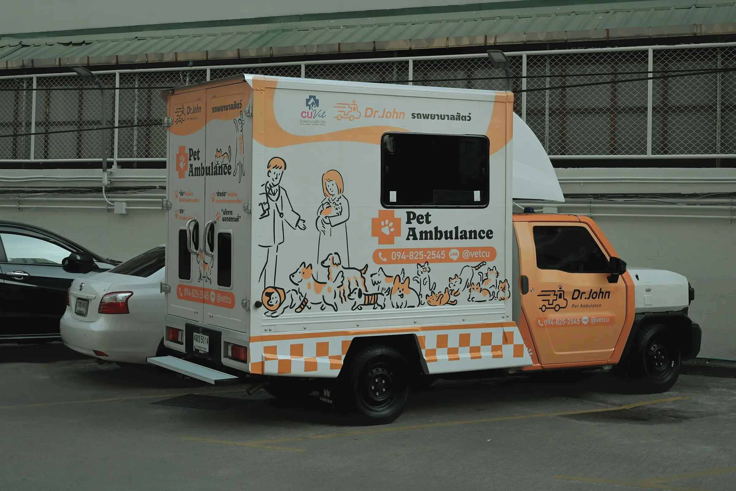 A van part-way through a vinyl wrap.